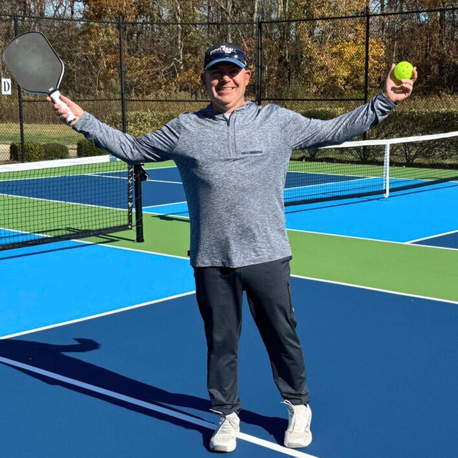 Eric Fransen, Owner of Klik Marketing, on a pickleball court